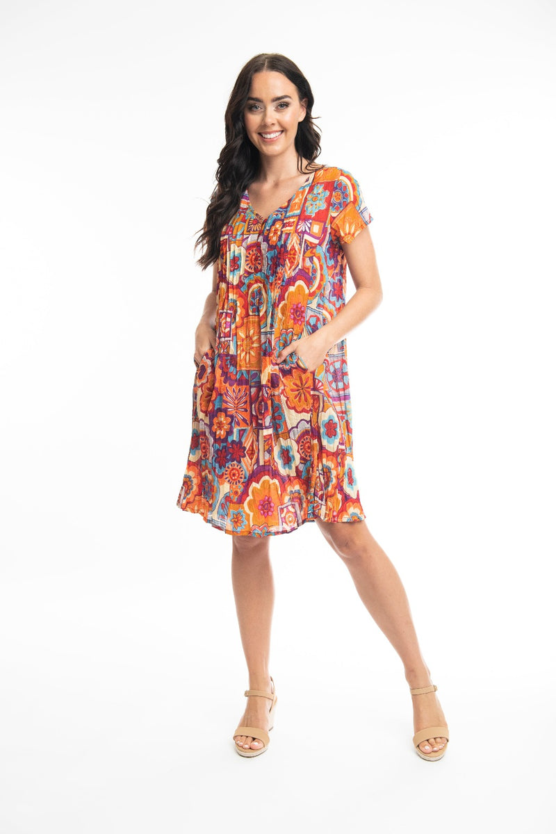 The Pissouri Easy Fit dress has pintucking detail on the front & back bodice & falls to the knee. It has a cap sleeve & is a loose fit.