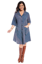 The Japanese coat frock dress has an a-line shape & over the elbow length sleeve. The wooden buttons are a simple finish to a garment brimming with design features.