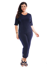 The Trieste Dolman Top is simple & stylish. It can coordinate back with printed or striped pants.