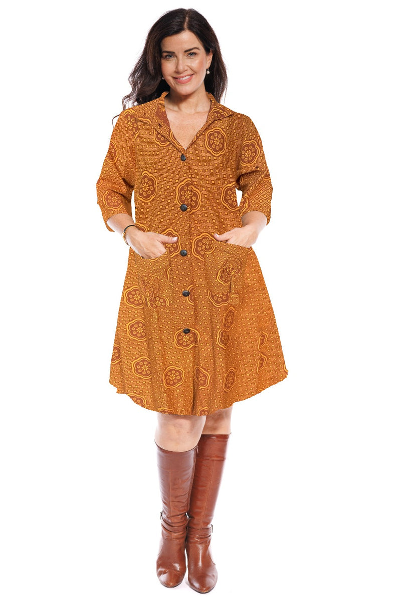 The Japanese coat frock dress has an a-line shape & over the elbow length sleeve. The wooden buttons are a simple finish to a garment brimming with design features.